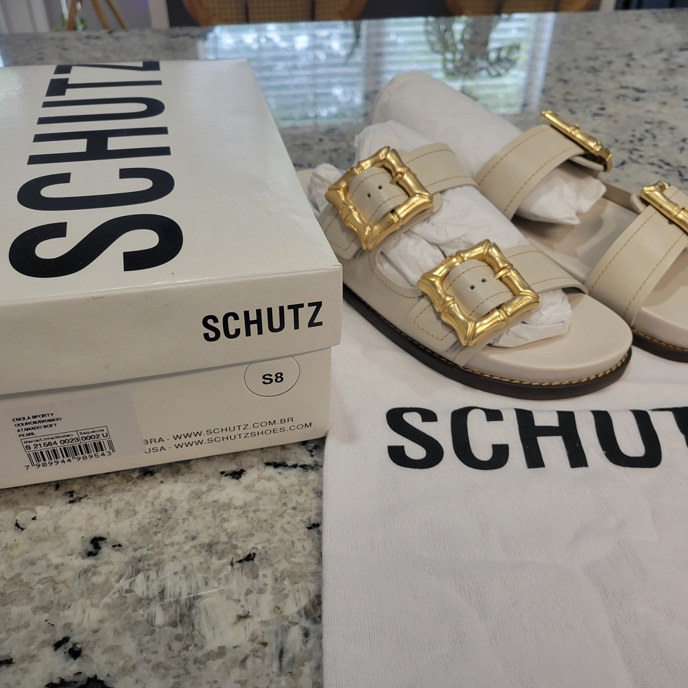 Schutz Cream Sandals with Gold Buckles